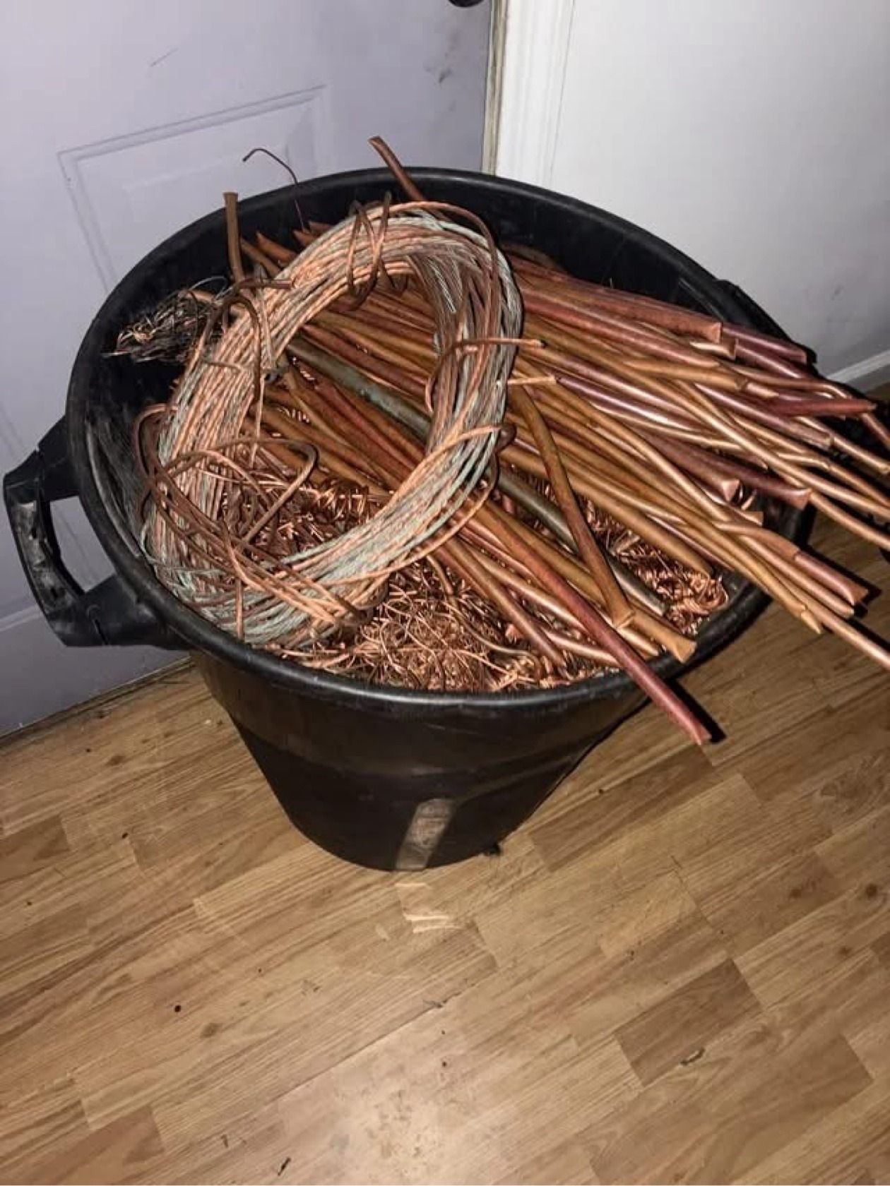 Bin of stripped bare bright copper wire pieces
