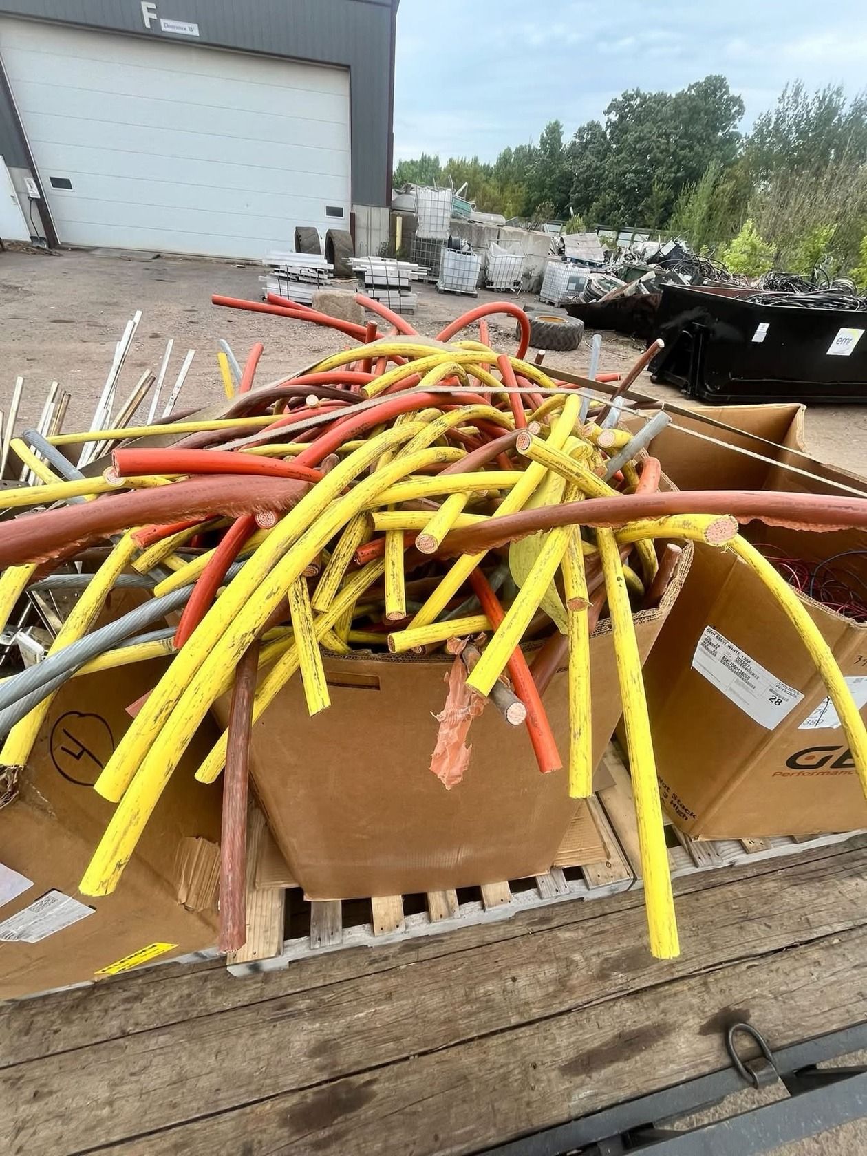 Gaylord of yellow and red insulated THHN building-wire cutoffs