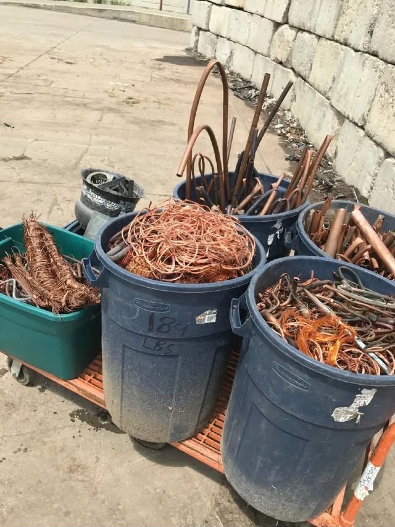 Bins of stripped #1 copper wire nests and copper tube
