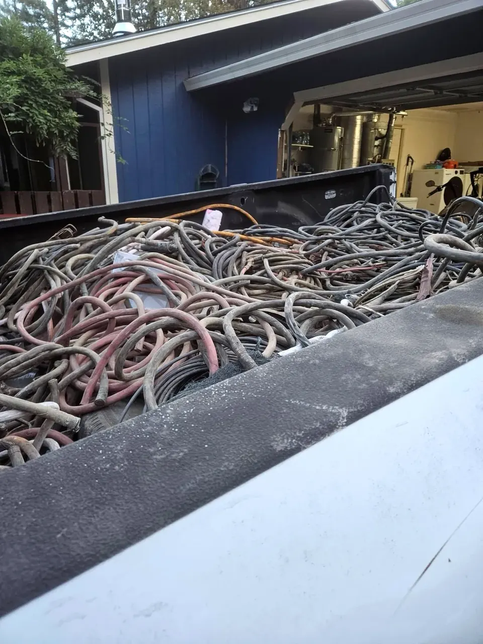 Truck bed full of mixed cable