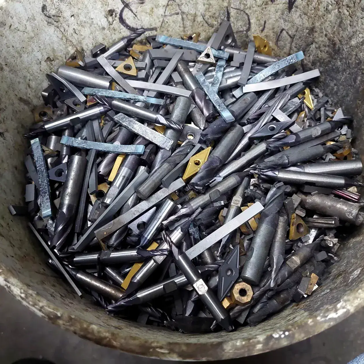 Bowl of used twist drill bits