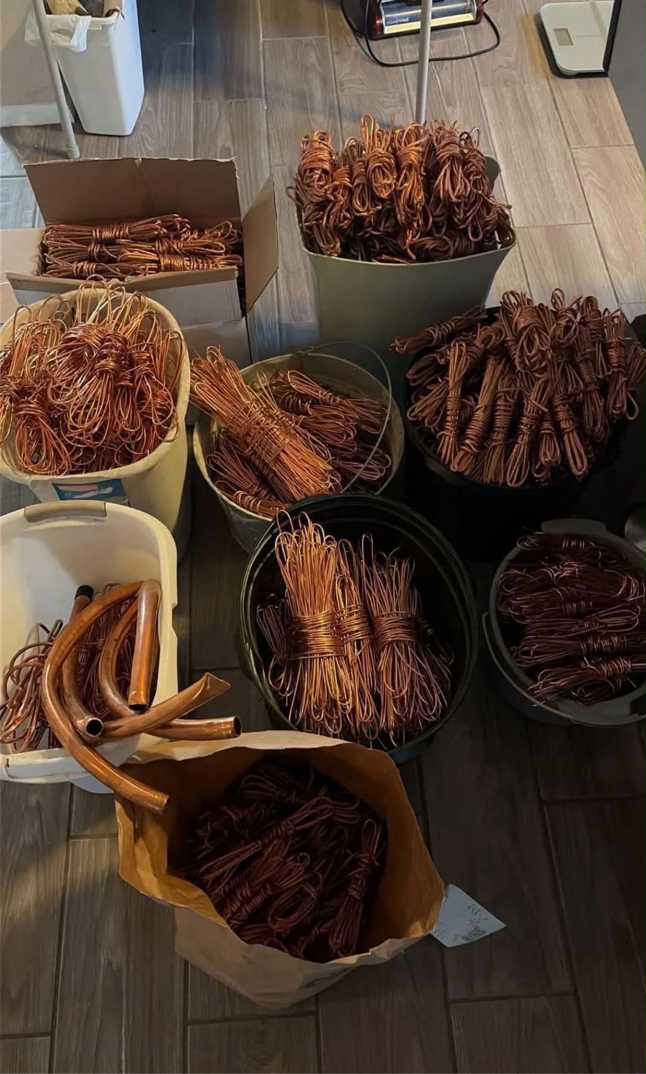 Buckets of bare bright copper wire