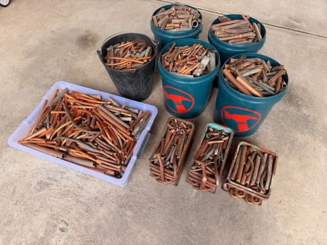 Buckets of copper tube cutoffs